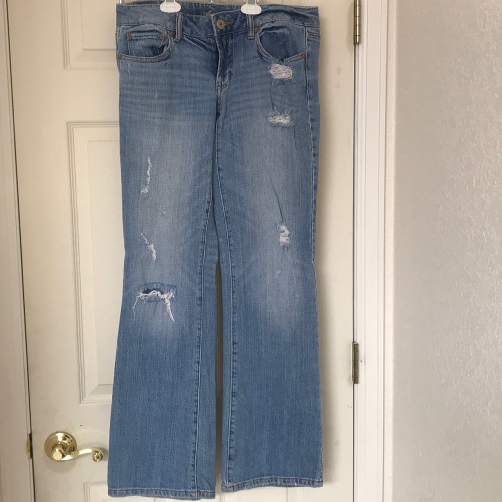 Destroyed bootcut jeans